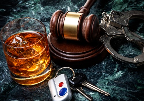 Alcohol, key, gavel, and handcuffs, DUI Attorney Pekin IL
