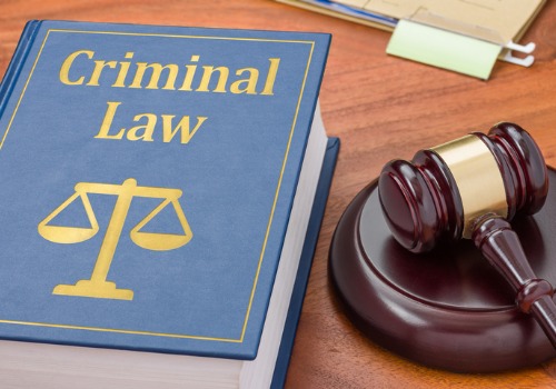 Criminal Law book and gavel Criminal Defense Attorney Washington IL