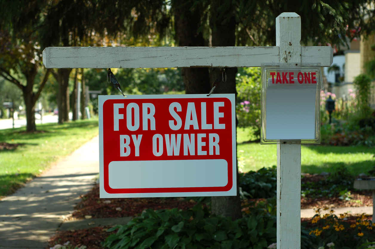 A For Sale By Owner Sign in front of a home for sale in Central Illinois