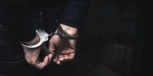 Defense for Felonies & Misdemeanors in Illinois 2 A person gets handcuffed. Essig Law Office offers legal defense for Felonies & Misdemeanors in IL